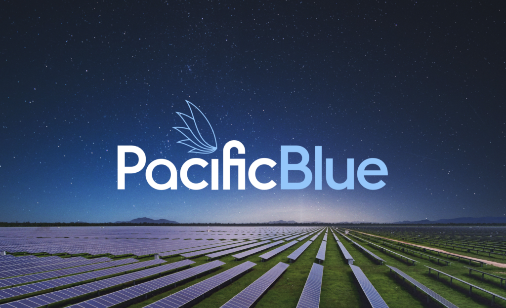 Pacific Blue logo overlaying a solar farm at sunset, with rows of solar panels stretching into the distance and mountains in the background, symbolizing sustainable energy solutions.