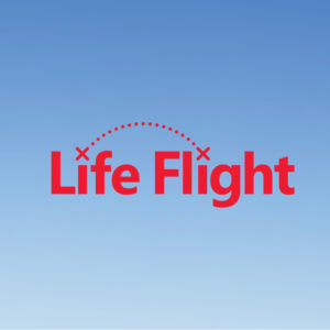 Logo for Life Flight featuring the text 'Life Flight' in bold red with a dotted arc above it, symbolizing flight, set against a gradient blue sky background.