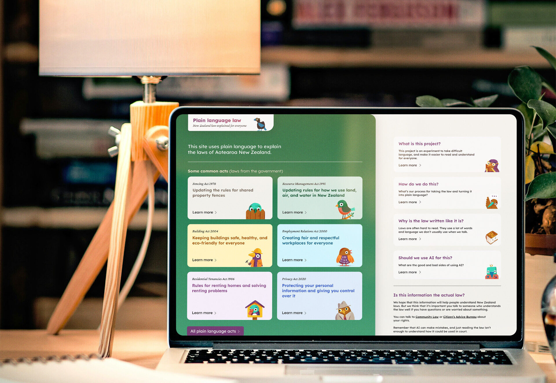 Laptop displaying the Plain Language Law website, featuring a user-friendly interface with simplified legal information for New Zealanders. The screen shows categorized laws, explanations, and answers to common questions, designed to enhance accessibility and understanding.